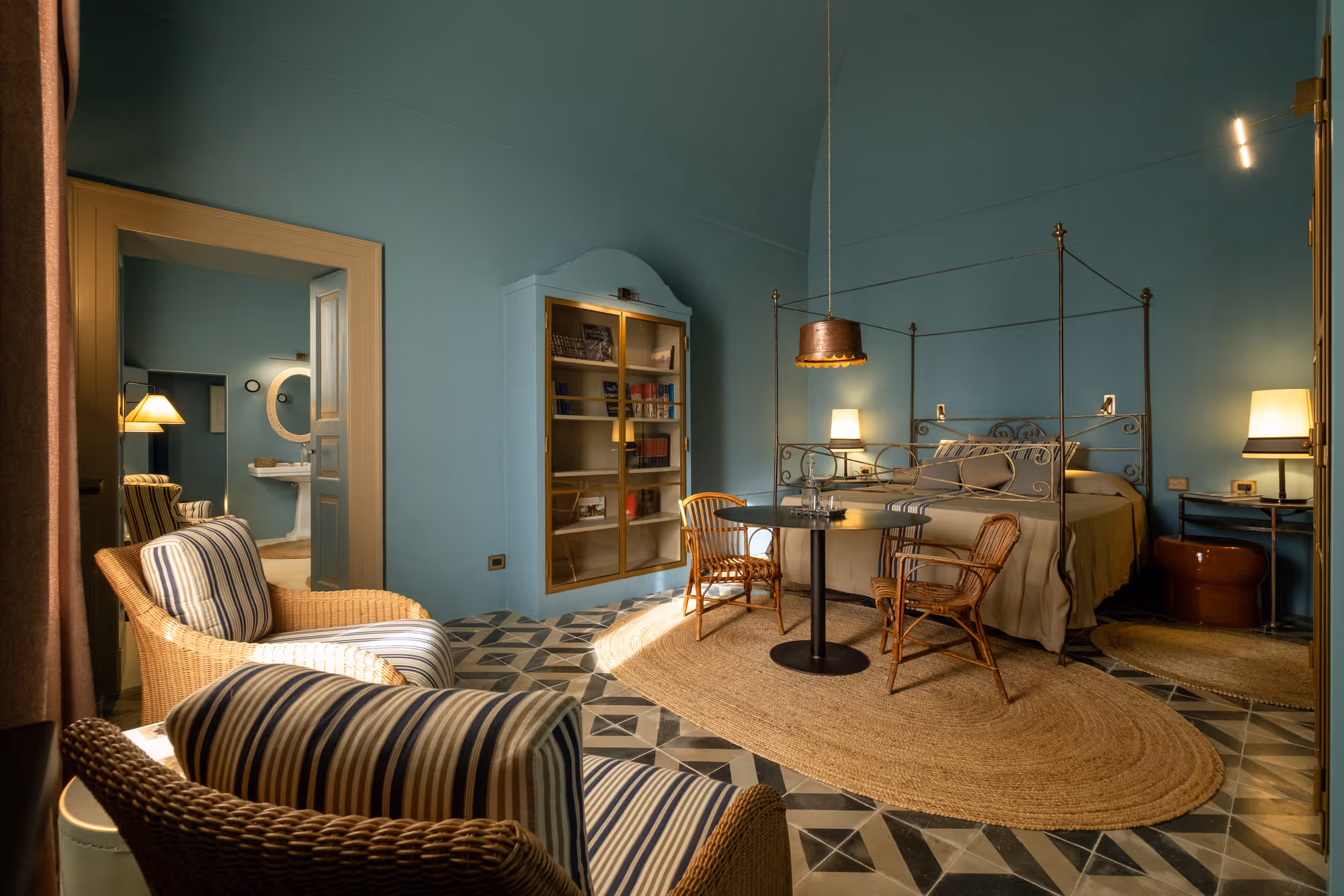 Serenitas Domus bedroom with vaulted ceilings and canopy bed
