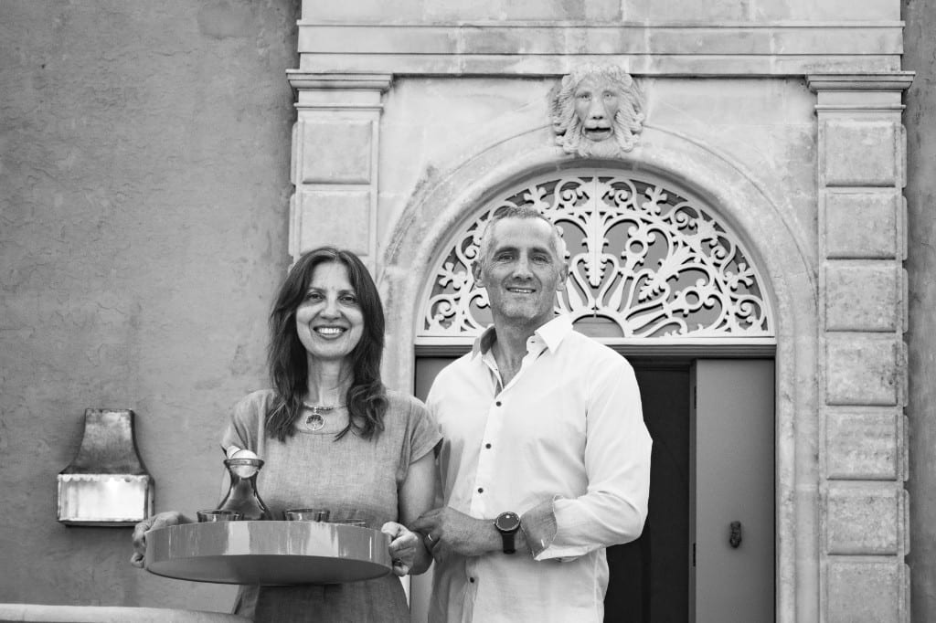 Gabriela and Elio at the entrance of the palazzo