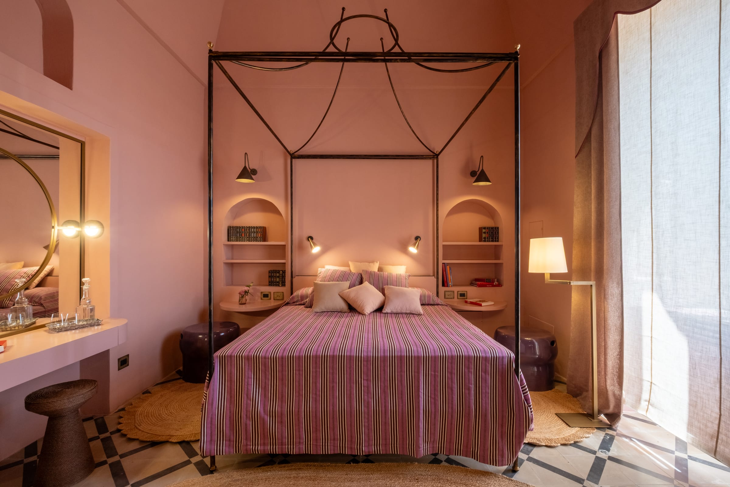 Essentia Creatix suite with arched windows over Martina Franca